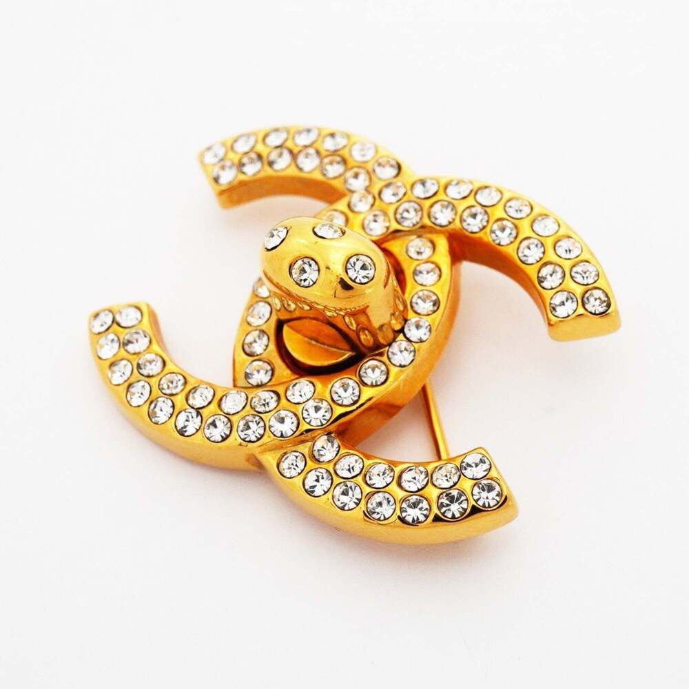 CHANEL Gold Logo Brooch - Picture 2 of 6